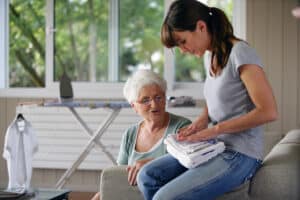 Companion care at home caregivers can help aging seniors with daily living skills.